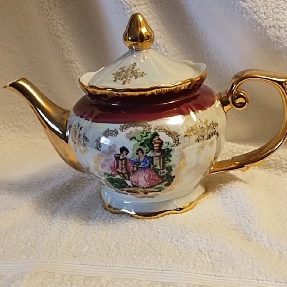Elegant Gold and Burgundy Teapot